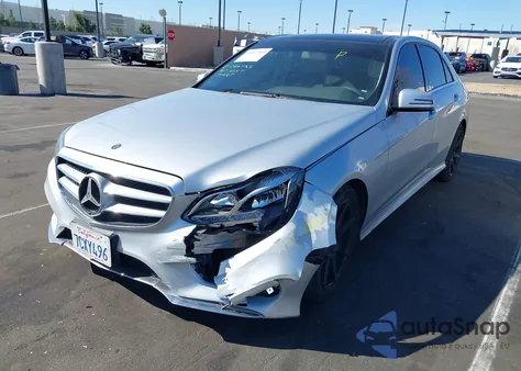 2014 Mercedes-Benz E 350 z USA, uszkodzony, nr VIN WDDHF5KB7EA929400